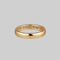 Gold band posey ring with words inside