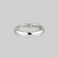silver band posey ring with words inside